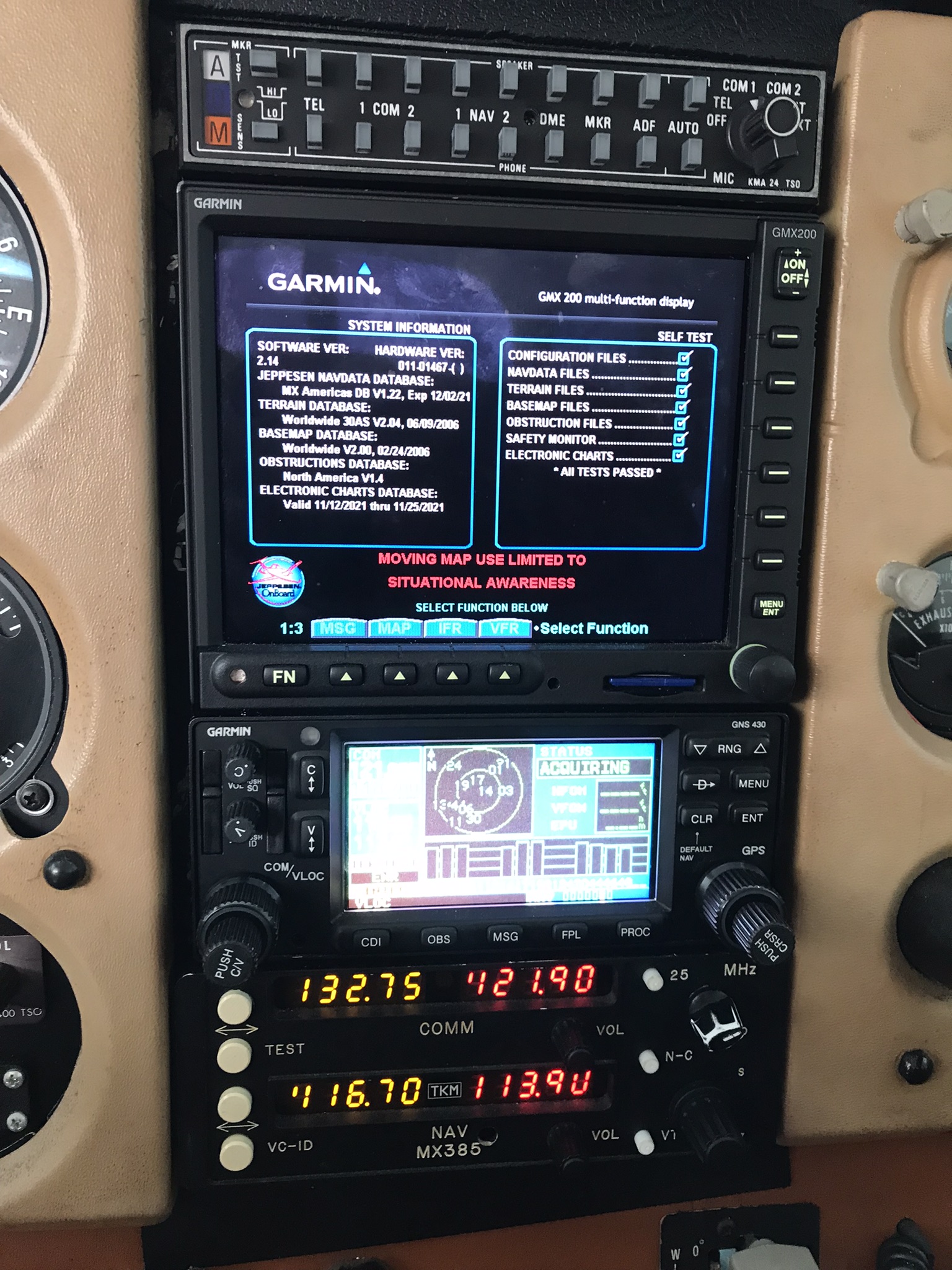 Avionics stack inside Cessna 172N N2723E showing the Garmin navigation and radio equipment.