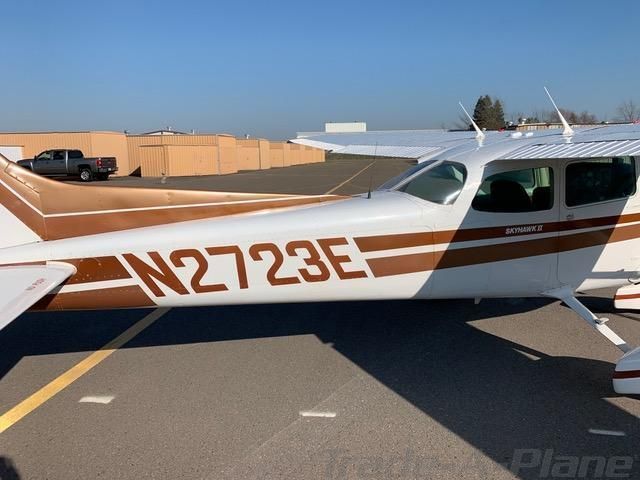 Close exterior view of Cessna 172N N2723E parked on the ramp for Marshals Technology aircraft rental.