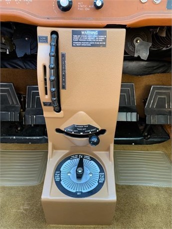 Center console and trim controls inside Cessna 172N N2723E.