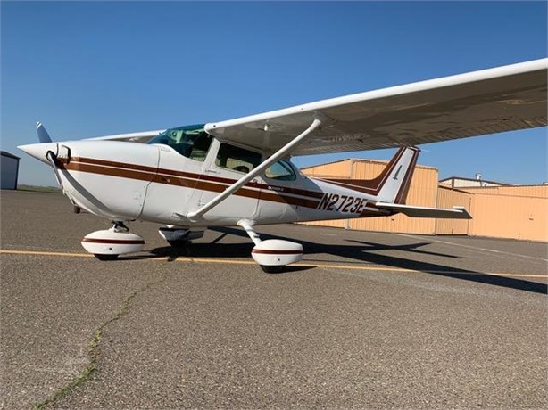 Front exterior view of the Cessna 172N rental aircraft parked on the ramp.